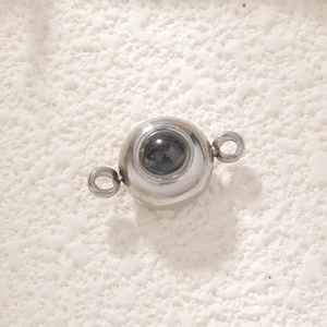 Macro shot of silver magnetic jewelry clasp for bracelets with dual connecting rings