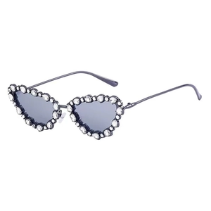 Cat eye heart sunglasses with rhinestones and smoke grey lenses on white background