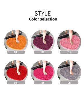 Detail showcasing six color variants of heart-shaped chenille absorbent bath mats