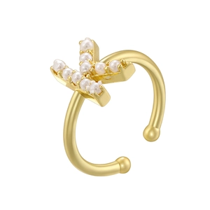 Detailed close-up of a gold-plated letter X ring featuring elegant inlaid white pearls