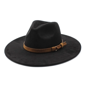 Detail of black wide brim fedora with brown suede belt and golden metal buckle