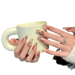 Handmade brown gradient press-on nails with luxury rhinestones and gold leaf details