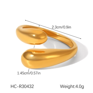 Detailed view of golden teardrop open ring with size measurements in centimeters and inches