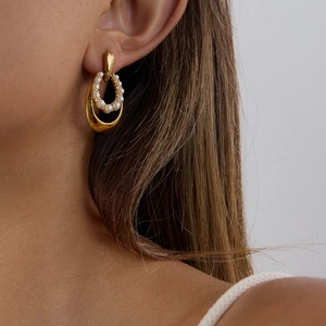 Elegant gold-tone stainless steel pearl drop earrings for women in a minimalist oval design
