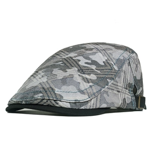 Detail of gray camouflage flat cap with metal adjustment buckle and black visor