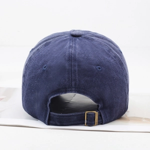 Navy blue washed cotton baseball cap with adjustable metal buckle back view