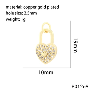 Detailed view of a gold-plated heart padlock pendant with star motif and zircon inlays