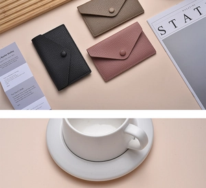 Lychee texture leather mini wallet set in black, light brown, and pink with snap buttons