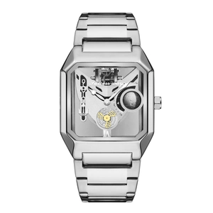 Close-up of skeleton mechanical watch dial with octagonal silver steel case and gears