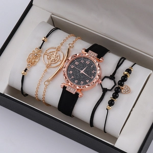 Detailansicht des eleganten Blumen-Uhren-Sets in einer hochwertigen schwarzen Geschenkbox
