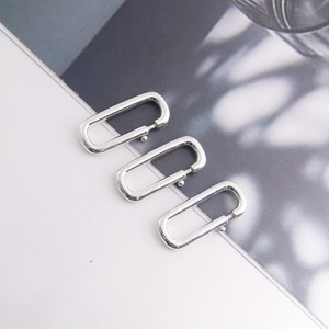 Macro shot of silver oval spring clasps for DIY jewelry necklace and bracelet making
