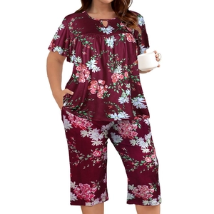 Women's plus size floral loungewear set with hollow-out short sleeves and cropped pants