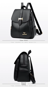 Detail of black pebbled leather backpack with gold kangaroo logo and multi-zipper pockets
