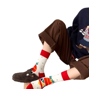 Christmas crew socks with red white pattern and festive ornaments for men and women