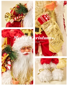 Close-up of Santa Claus doll showing red sequin robes, golden bag and facial details