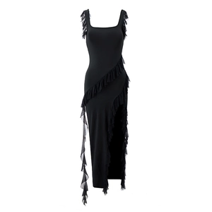 Detail view of black bodycon dress featuring layered ruffles and a stylish side slit design