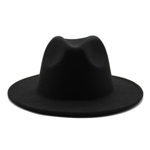 Macro detail of black felt fedora hat featuring a classic C-crown and leopard print interior