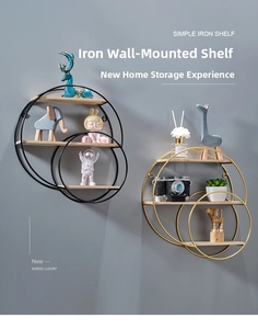 Nordic wall shelf in gold and black metal rings with wood planks on blue wall