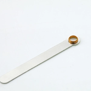 Luminous aluminum metal clock hands with brass ring bushing on white background