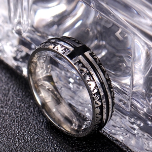 Vintage 6mm titanium steel ring featuring black cross engravings and a polished silver finish