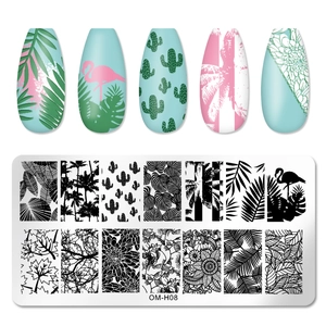 Macro detail of tropical flamingo and palm leaf patterns on rectangular nail stamping plate