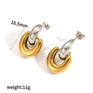 Detailed view of two-tone U-shaped earrings in 16k gold and silver showing 16.5mm size