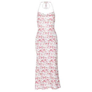 Detail view of the backless tie-up design and pink floral print on white maxi dress