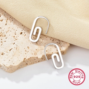 Minimalist S925 sterling silver paperclip earrings with cubic zirconia on textured stone