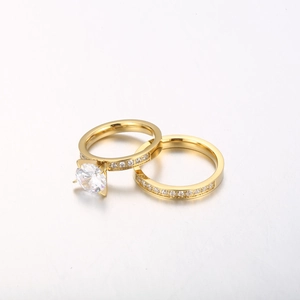 Elegant gold bridal ring set with sparkling round zircon stone and micro-pave accents
