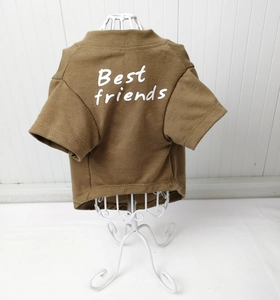Brown cotton pet T-shirt with Best Friends lettering on a white metal mannequin display