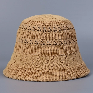 Close-up of khaki breathable knitted bucket hat showing detailed hollow crochet texture