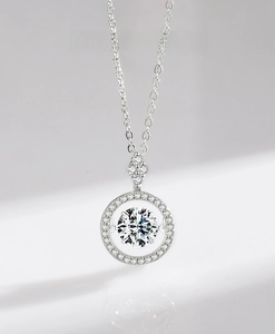 Close-up of a 925 sterling silver dancing stone necklace with micro-pave setting detail
