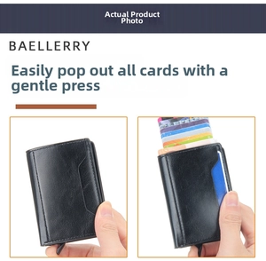 Macro detail of black leather wallet with automatic pop-up aluminum card holder mechanism