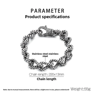 Macro view of vintage stainless steel twisted rope chain bracelet with lobster clasp