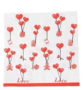 Detail of Valentine's napkins featuring red heart balloons and teddy bear patterns