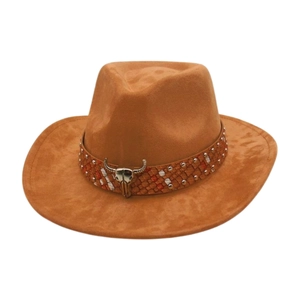 Detail of western cowboy hat featuring braided leather band and metal bull skull ornament