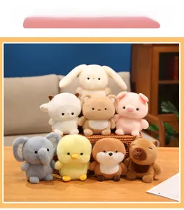 Variety of cute plush animals including bunny and capybara in a cozy home setting