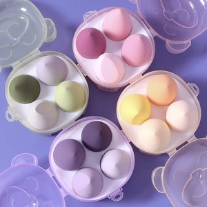 Set of 16 ultra-soft makeup sponges in 4 boxes with bear-shaped bases and gradient colors