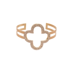 Elegant gold clover open bangle with sparkling cubic zirconia on a clean white background