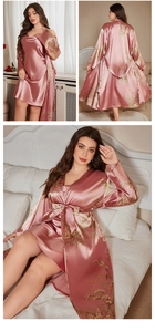 Detail of silk satin V-neck nightgown and matching floral robe in elegant pink