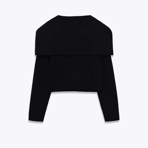 Short black knitted jacket with wide shawl collar and slim fit silhouette
