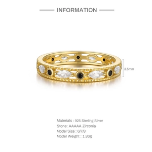 Detail of 925 silver gold ring featuring alternating marquise and round cubic zirconia
