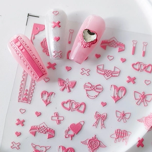 5D embossed heart and bow nail stickers featuring pink 3D relief designs on nails