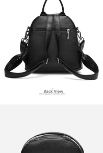 Detail view of black lychee grain PU leather backpack with anti-theft zipper and straps
