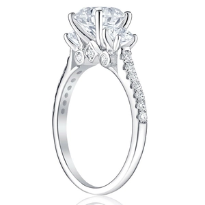 Macro detail of high-polish silver ring with three round-cut sparkling cubic zirconia stones