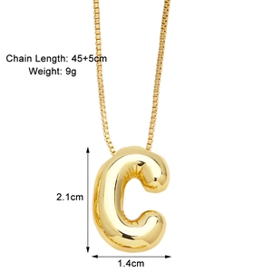 Detailed view of gold puff letter C pendant necklace with dimensions and chain length