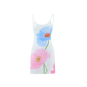Detail of white strap dress featuring large blue and pink floral prints and a slim A-line fit
