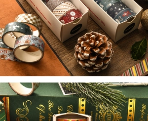 Close-up of Christmas washi tape set with gold foil motifs and winter decorations