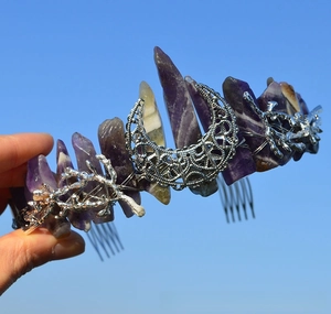 Detail of purple crystal cat ear headband with crescent moon and silver hair comb