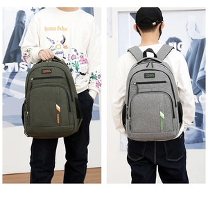 Dual view of army green and light grey canvas business backpacks with multi-layer zippers